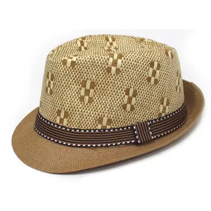 Close-up detail of the woven straw fedora hat, showing texture, geometric pattern and band.