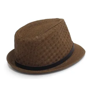 Detailed view of a stylish brown paper straw fedora hat, classic summer sun shade.