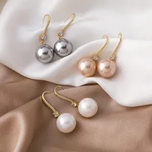Elegant pearl hook earrings with sparkling crystals, perfect for daily wear and chic styles.