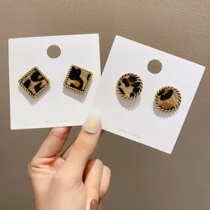 Vintage leopard print earrings with gold rope edge design, chic winter style for women daily.