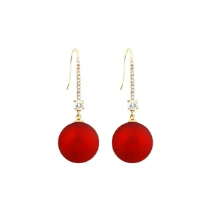 Exquisite detail of long red ball earrings with sparkly zircon pavé bar and gold finish hook.