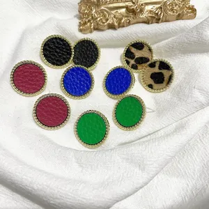 Chic retro round stud earrings with gold rope edge, multi-color leather and leopard print.
