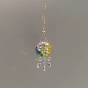 Colorful crystal glass ball hanging ornament window suncatcher with gold chain pendant.