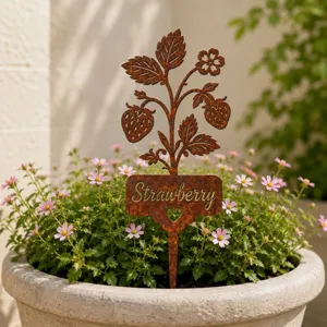 Closeup detail of rusty iron strawberry plant marker inserted in potted flowers garden decor