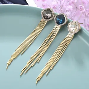 Élégantes boucles d'oreilles longues à pampilles avec strass géométriques, bijoux tendance.