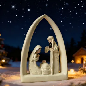 Detail view of resin Nativity figurine featuring holy family under arch, perfect for holiday decor.
