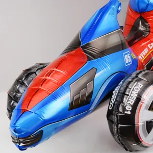 Detailed view of 3D racing car foil balloon, blue and red inflatable party decor.