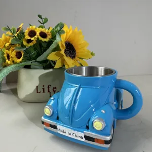Beetle shaped coffee mug detail view, creative ceramic and stainless steel car cup gift.