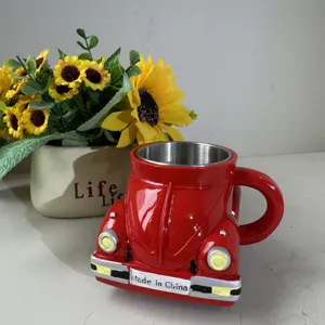 Red beetle shaped coffee mug with stainless steel liner, unique car design for coffee lovers.