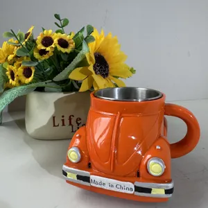 Beetle shaped coffee mug with stainless steel inner liner, unique car design for coffee lovers.