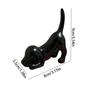 Black resin dachshund dog figurine detail, cute animal sculpture for home decoration.