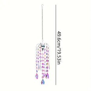 Crystal chandelier prism detail featuring multicolored reflective beads and metal chain.