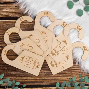 7-piece wooden baby clothes size dividers, cute double-sided closet organizers for nursery decor.