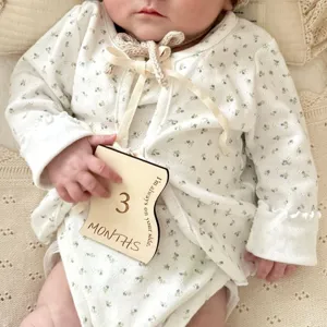 Wooden baby monthly milestone card set, newborn photo props, floral baby bodysuit apparel.