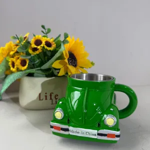 Detailed view of the creative green beetle shaped coffee mug with a stainless steel liner.