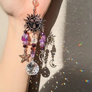 Amethyst suncatcher crystal prism hanging ornament with moon, sun and star charms for decor.