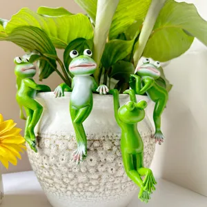 Creative green frog resin hanging figurines for potted plants, cute garden decor ornament.