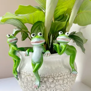 Creative green frog resin plant pot hanging ornament for home and garden decoration detail view.