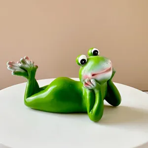 Resin green frog figurine detail view, creative desktop ornament for home garden decor.