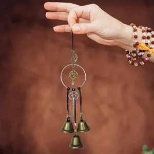 Witch bells door hanging protection wind chime with pentagram triquetra key and brass bells.