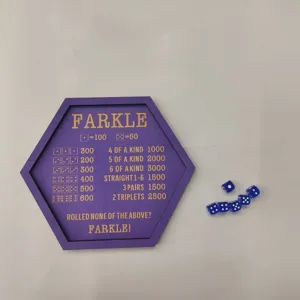 Wooden Farkle dice tray detail showing engraved scoring rules and blue dice for game night.