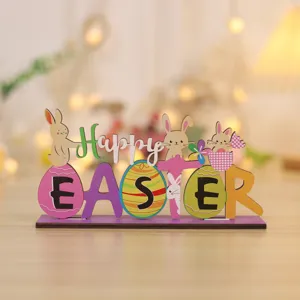 Close-up detail of the wooden Easter rabbit ornament with colorful eggs and festive text.