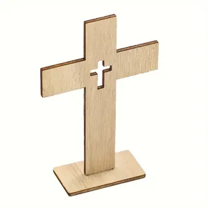 Close up detail of wooden cross ornament with hollow design and base for decor.