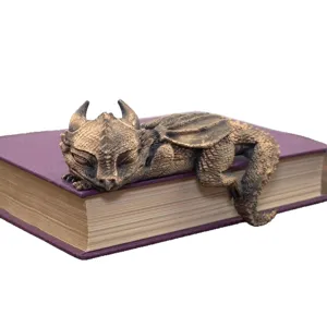 Sleeping dragon resin bookshelf ornament, vintage bronze fantasy desktop decor for home decor.
