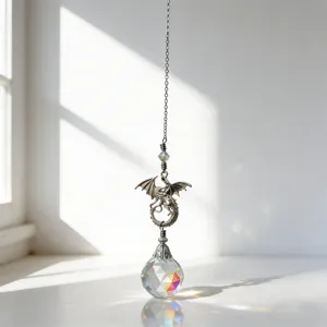 Detailed view of a vintage dragon crystal suncatcher pendant with prism ball for decor.