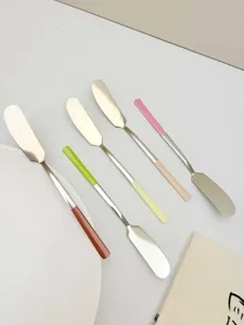 Creative 304 stainless steel butter knife with colorful long handle for spreading jam and cheese.