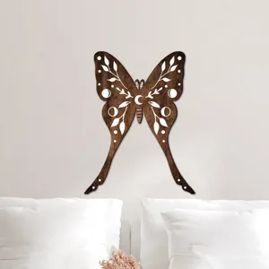 Wooden luna moth wall art detail, bohemian moon phase decor for bedroom wall hanging display.