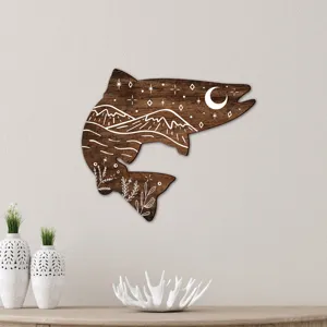 Handmade bohemian wooden fish wall art showing exquisite mountain and moon carving.