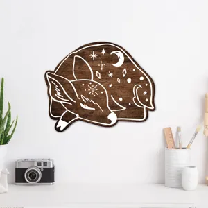 Bohemian wooden deer wall art detail, celestial moon and stars motif, rustic home decor close up.