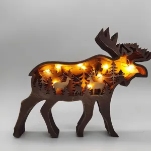 Élan en bois sculpté détail LED forêt lumière décor ornement de table accent de bureau