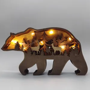 Ornement d'ours en bois sculpté multicouche avec lumières LED pour déco de bureau.