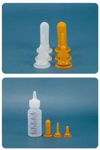 Detail view of pet nursing bottle and silicone nipples set designed for kittens and puppies feeding.