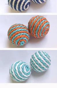 Detail view of colorful woven sisal cat toy balls, durable and safe pet scratching playballs.
