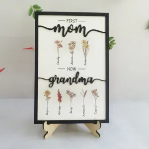 Personalisierte Muttertag Holztafel mit Geburtsblumen und personalisierten Familiennamen.