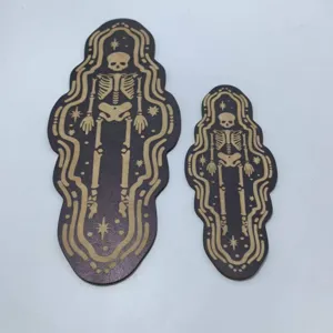 Detailed close-up of Gothic Halloween wooden skeleton wall hanging plaques and decor pieces.