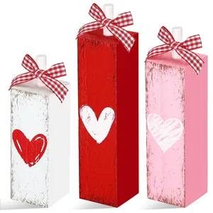 Valentine's wood block heart decor detail view, rustic tabletop ornament, tiered tray display.