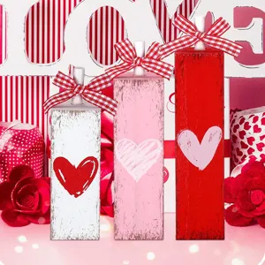 Valentine's Day wooden block table decoration with heart pattern and red plaid bows for home.