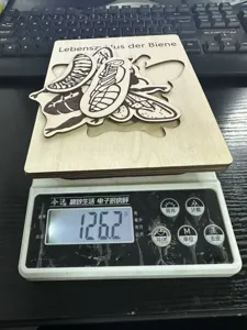 Wooden insect life cycle puzzle detail view, showing natural wood texture and precision laser cut.