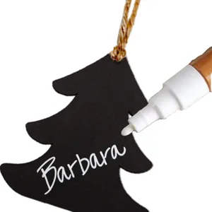 Wooden Christmas tree chalkboard hanging tag detail, rustic message ornament with twine rope.