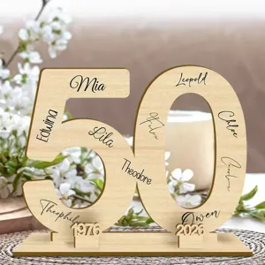 Wooden number 50 display detail, personalized name engraving, party table decor close-up view