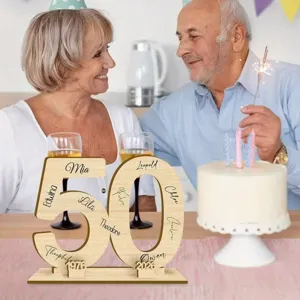 Wooden 50th birthday number plaque with custom names and dates detail scene view.