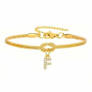 Bracciale catena serpente oro con ciondolo lettera F in cristallo e nodo elegante donna