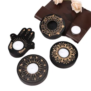 Wooden tealight candle holders set featuring zodiac and hamsa designs for home decor