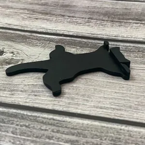 Black cat silhouette wooden craft detail view, cute home decor item for doors and frames.