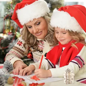 Detailed view of DIY 3D mini wooden Christmas tree decorations and festive desktop decor.
