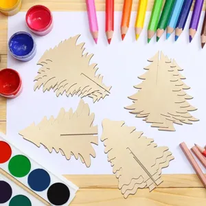 Close up detail of DIY wooden Christmas tree puzzle pieces with colorful paints and pencils.